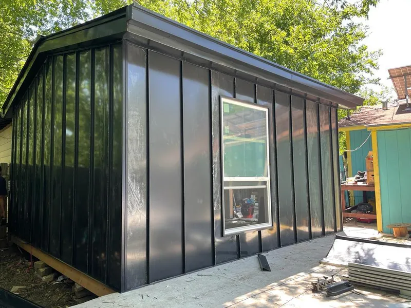 Black standing seam metal wall panels for Roof Inspection in Waynesville